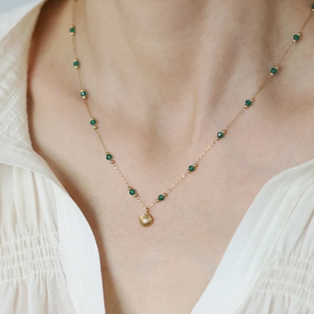 The cutest little shell green & gold necklace 🐚🐢